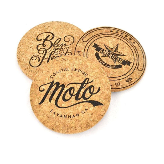 Three cork coasters with printed text and designs