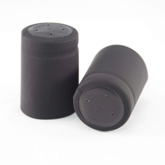 Matte black shrink cap with top disk and tear tape