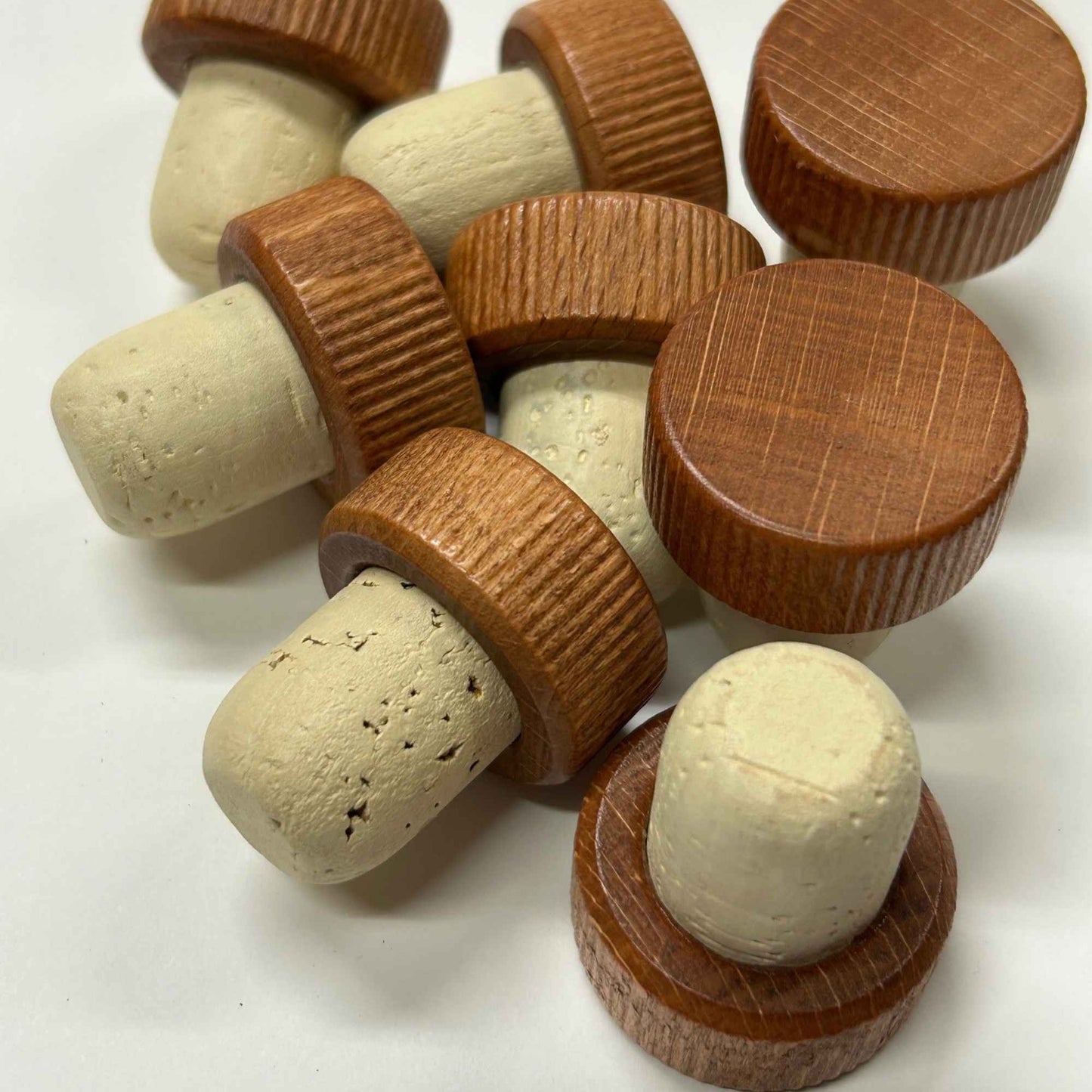 Light brown wood top stoppers with natural cork stem