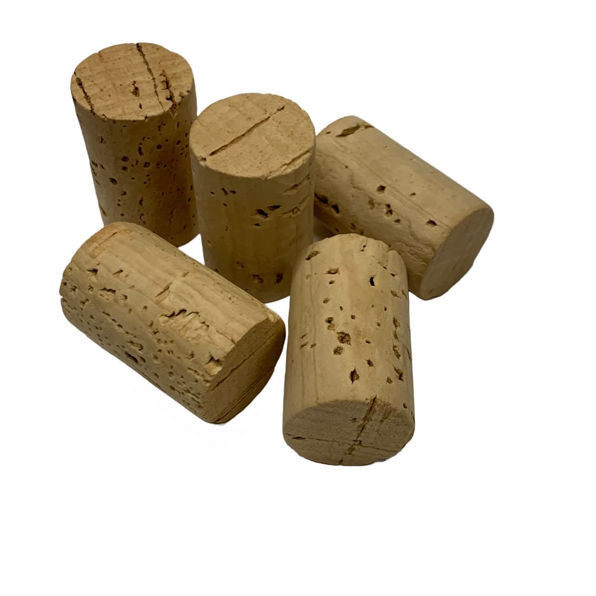 Five natural cork wine corks on a white background
