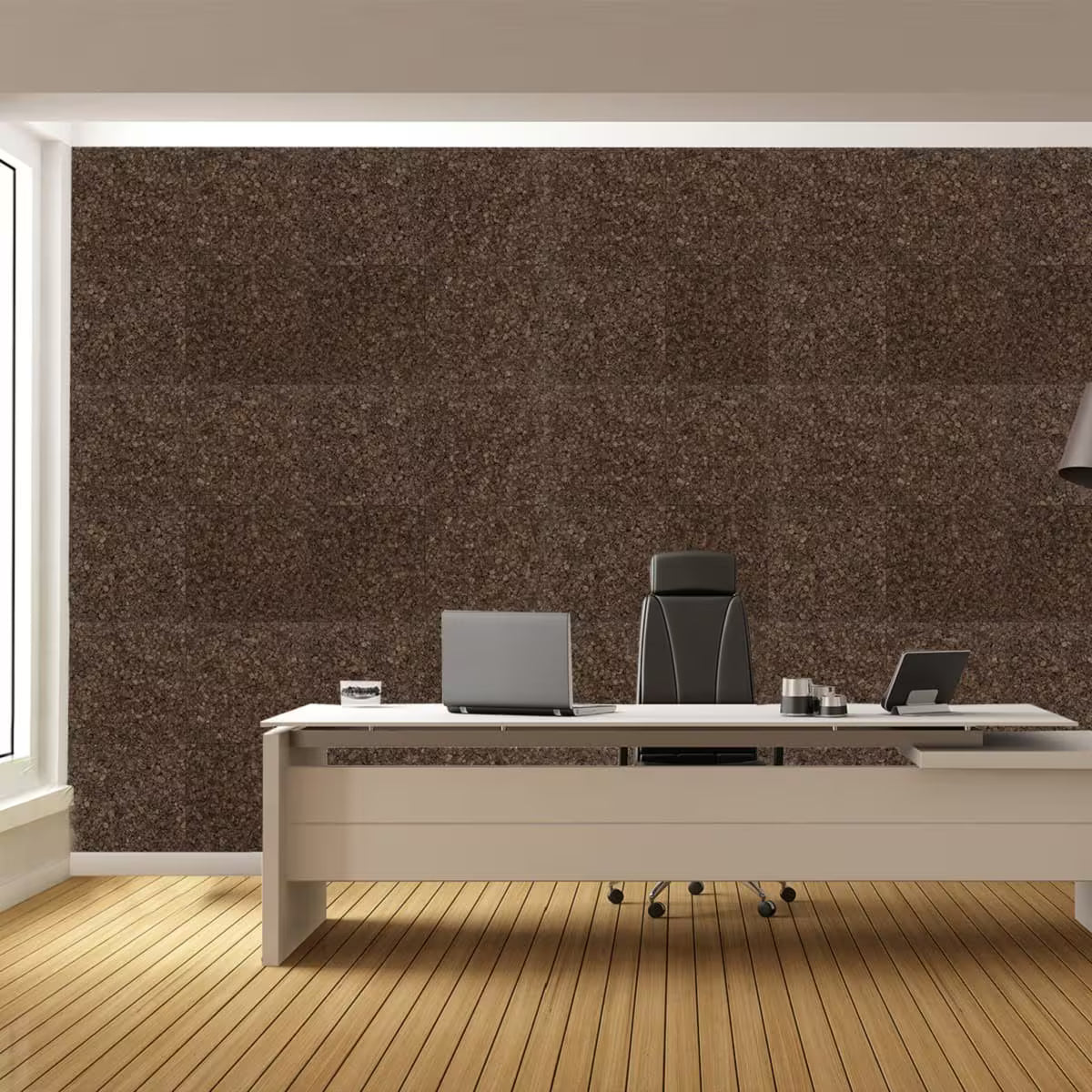 Dark cork insulation tiles installed on an office wall, showing natural cork texture and warm brown tone