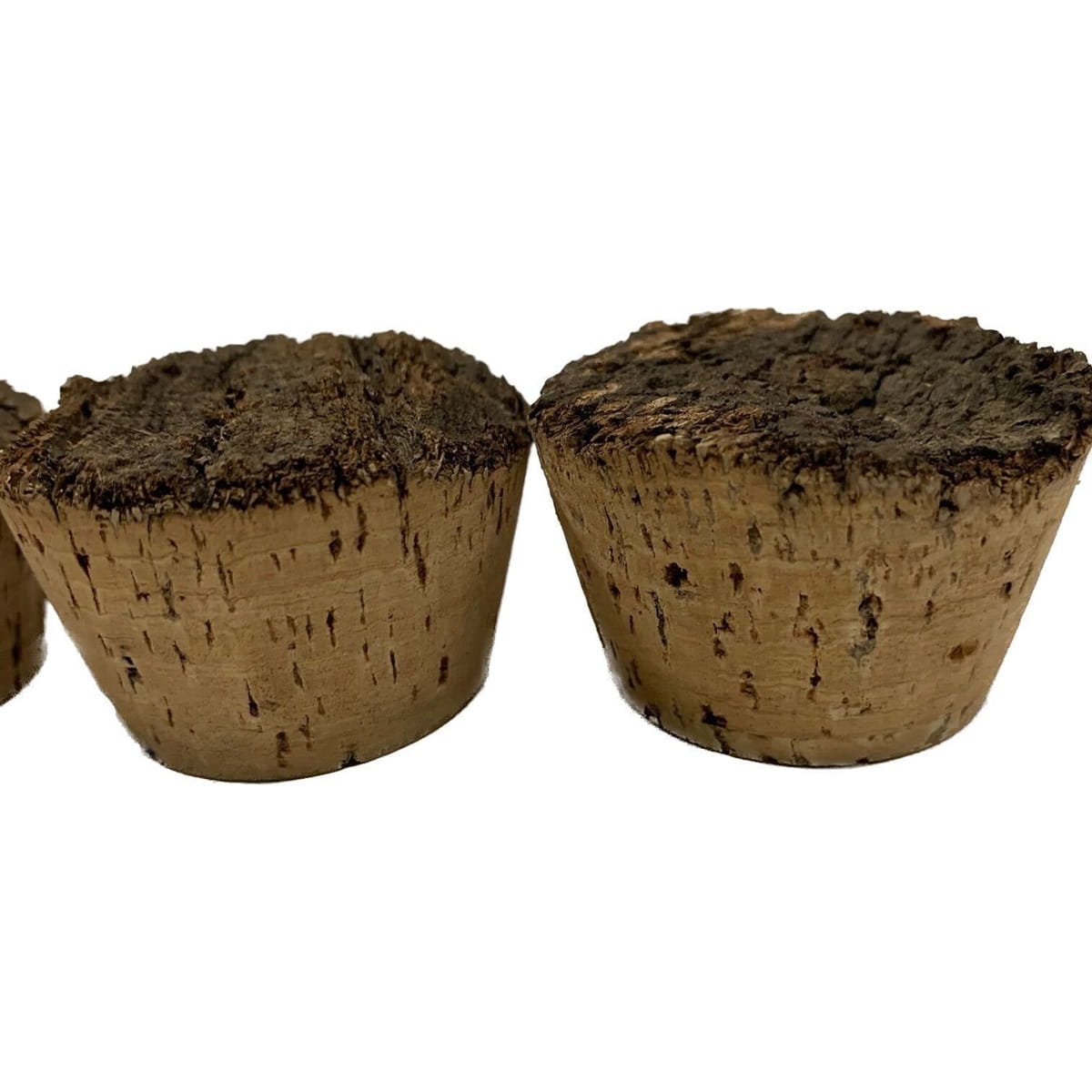 Two natural cork stoppers, showing the dark, rough, natural texture of the top and smooth, refined surface of the bottom. Solid cork.