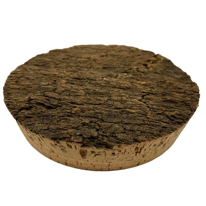 Extra large rough natural top cork stopper, close-up of the textured bark cork top. Often used for pottery and ceramic jars and containers.