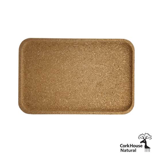 Rectangular cork serving tray with curved edges and a raised lip. View from overhead