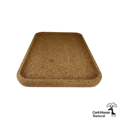 Side view of a rectangular cork serving tray with rounded edgs and a raised lip.