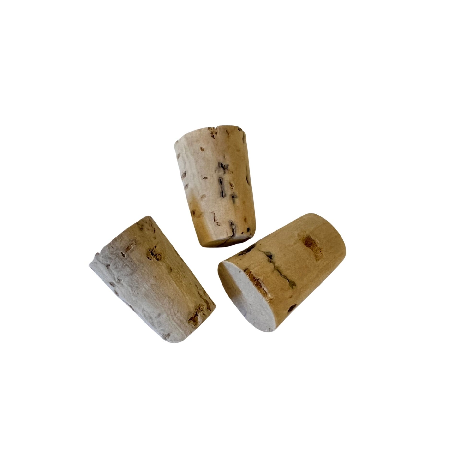 Side view of three RL01 tapered cork stoppers