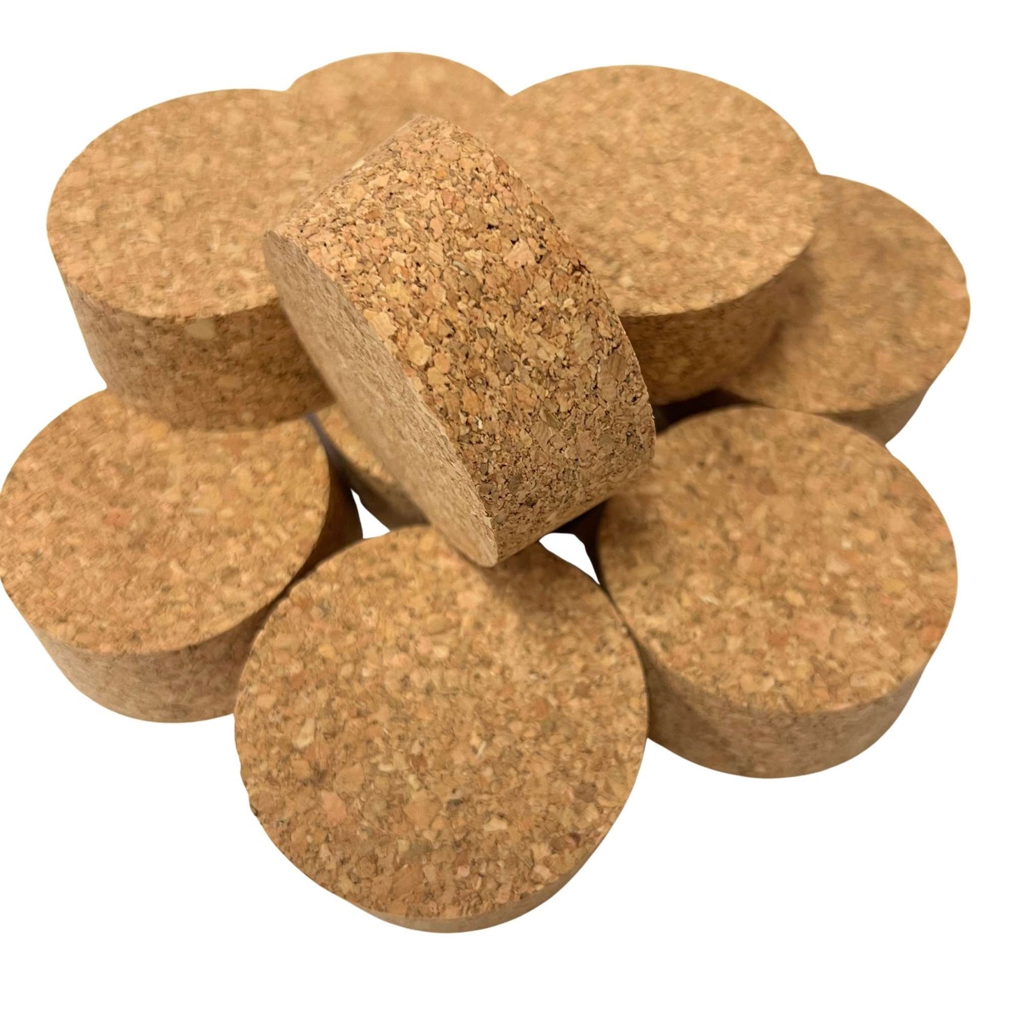 Bulk agglomerate short length tapered cork stoppers, closeup of side angle of a stopper, size SL32