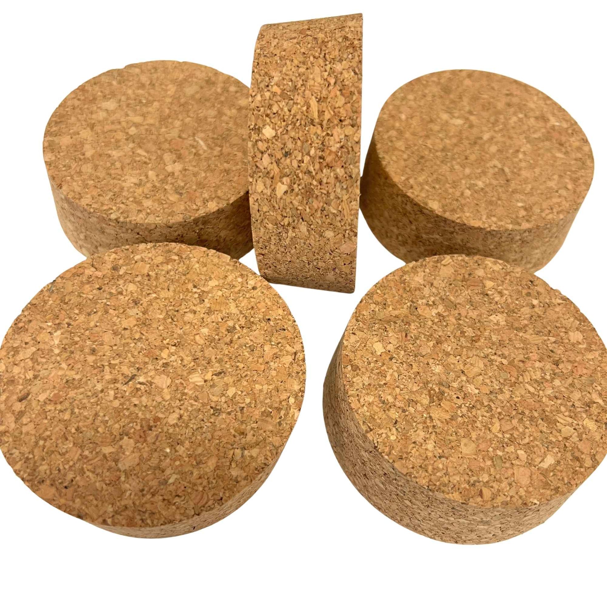 Various angled views of short-length tapered cork stoppers showing texture, size SL40