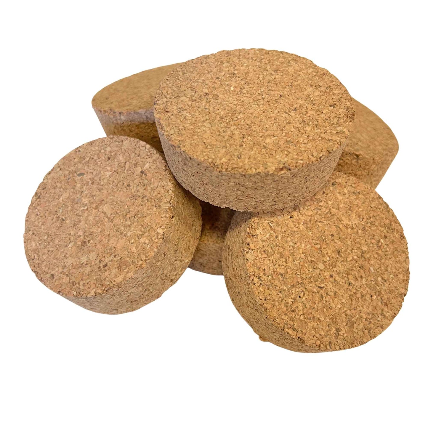 Pile of short length tapered cork stoppers in SL46 showing agglomerate texture and conical shape