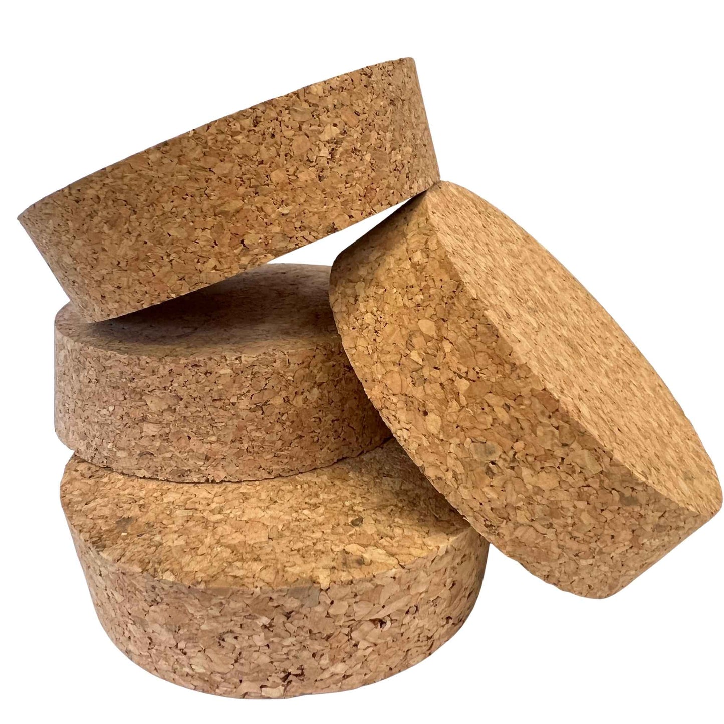 A stack of agglomerate short length tapered cork stoppers, size SL52