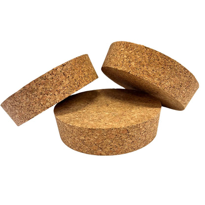 Various angled views of short-length tapered cork stoppers showing agglomerate texture and conical shape, size SL58