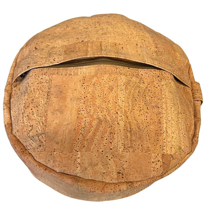 Round cork yoga pillow zipped closed, made with Harmony cork upholstery fabric.