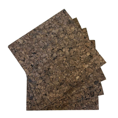 Chunky dark cork wall tile squares arranged to show four tiles and closeup of the large chunks of compressed cork