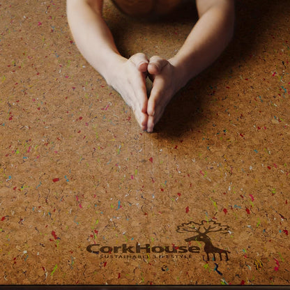 Cork yoga mat with a person's hands in a yoga pose, showing the Cork House logo on the mat.